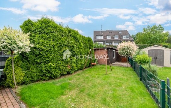Charmante Doppelhaushälfte mit Garten, Garage und vielseitigen Nutzungsmöglichkeiten