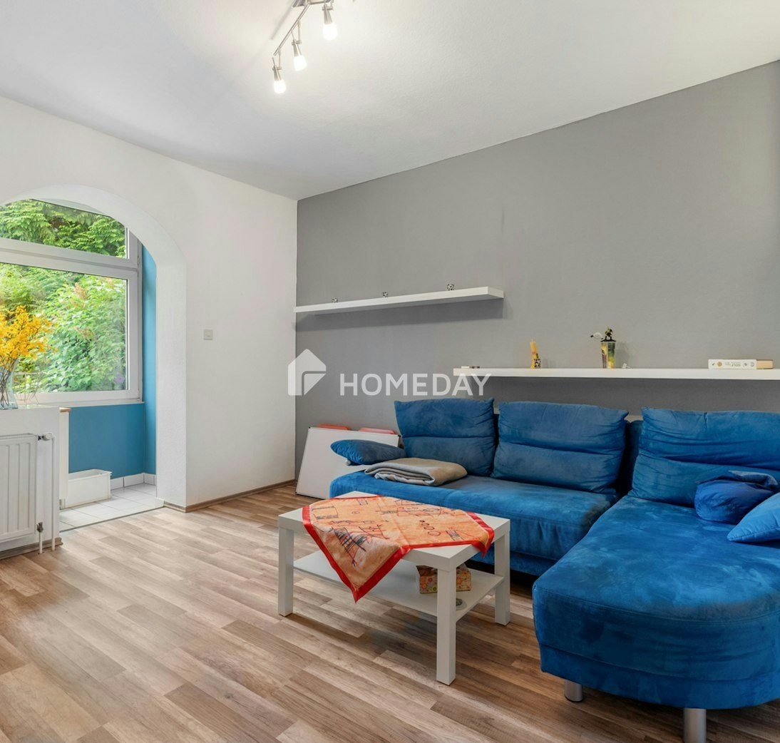 Charmante 2-Zimmer-Wohnung mit Gartenblick in gepflegtem Mehrfamilienhaus